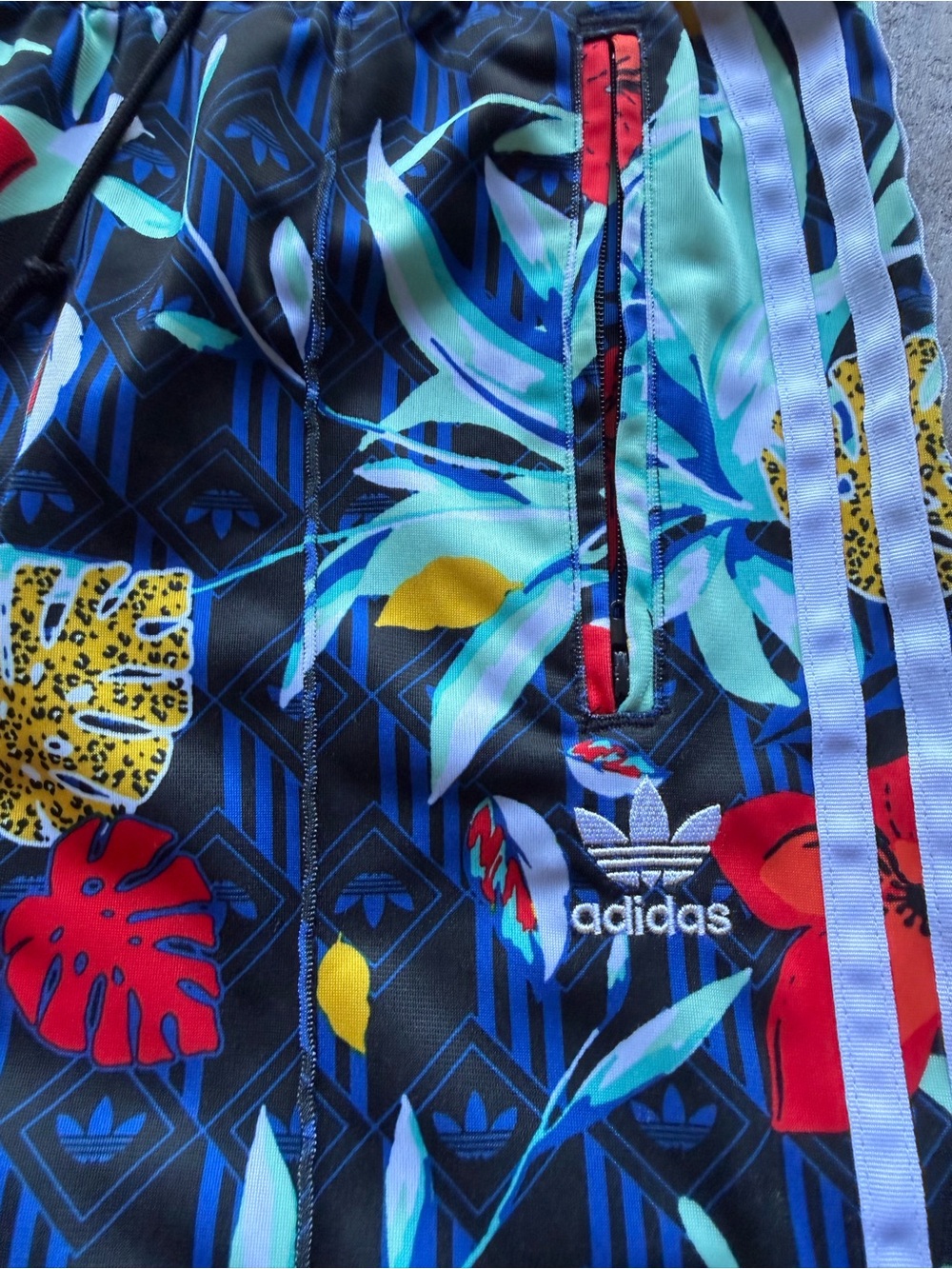 adidas Originals x HER Studio London Tropical Floral Track Pants.